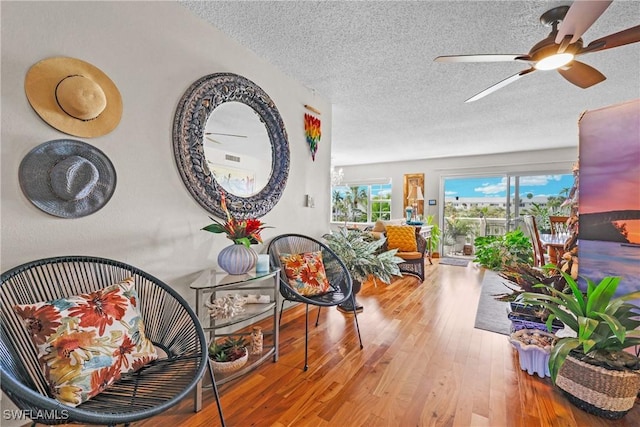 interior space featuring hardwood / wood-style floors and a textured ceiling