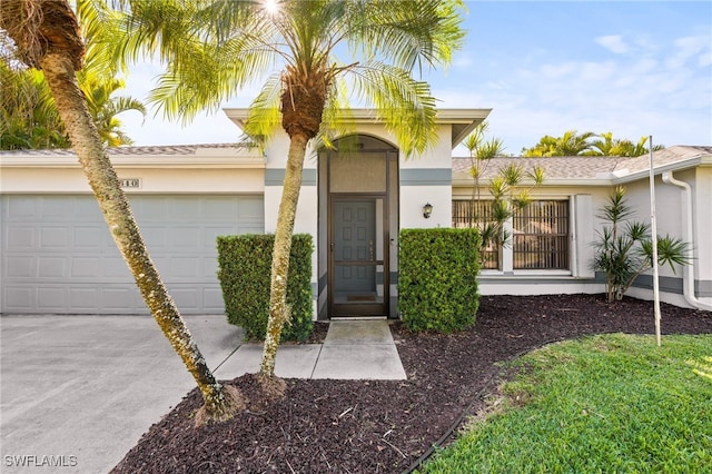 view of front of home with a garage