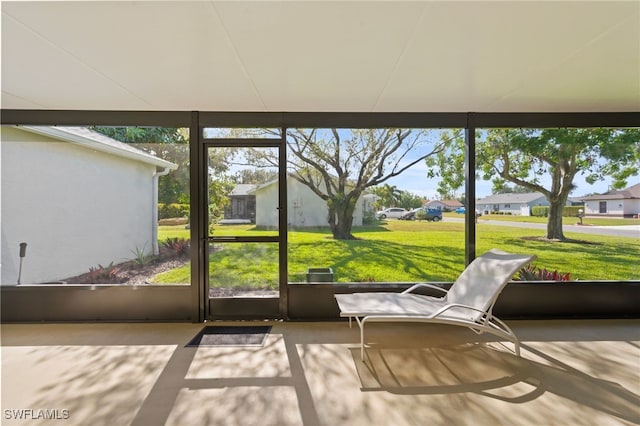 unfurnished sunroom with a wealth of natural light