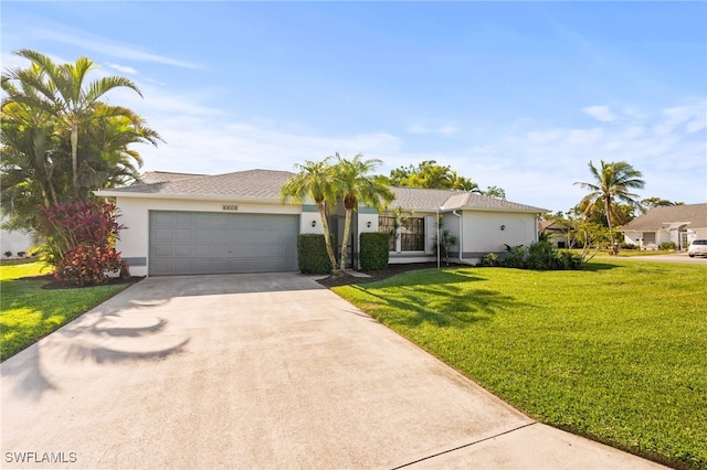 single story home featuring a garage and a front lawn