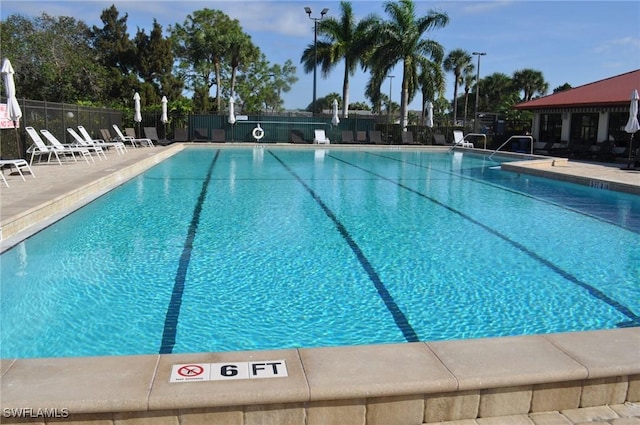 view of swimming pool featuring a patio area