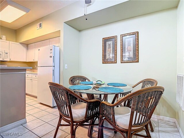 view of tiled dining room