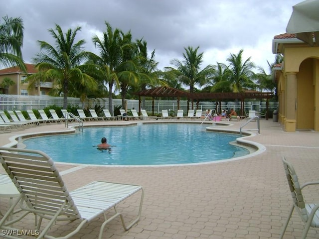 view of swimming pool featuring a patio