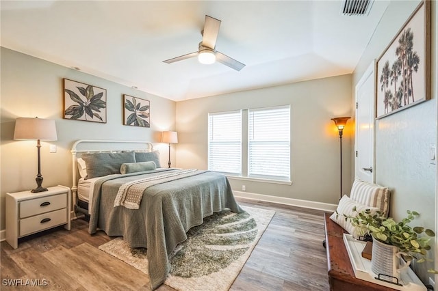 bedroom featuring ceiling fan and hardwood / wood-style floors