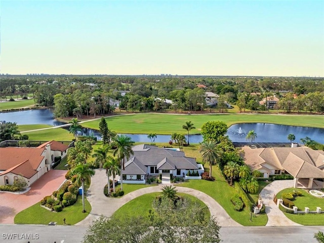 aerial view with a water view and view of golf course