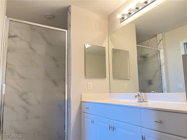 bathroom featuring vanity and walk in shower