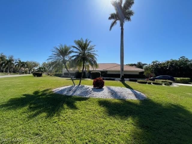 view of community with a lawn