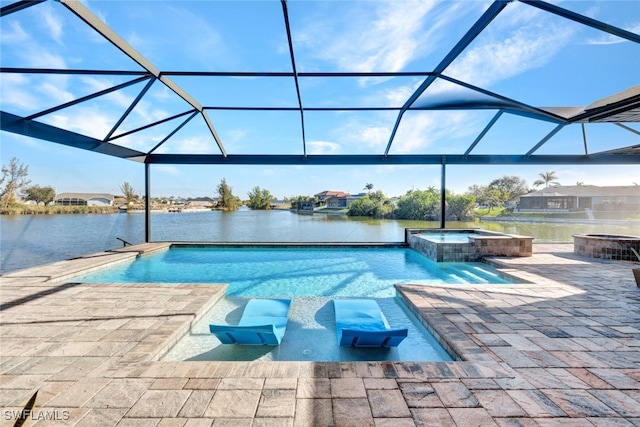 view of pool with an in ground hot tub, a patio, a water view, and a lanai