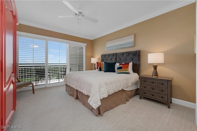 carpeted bedroom featuring access to outside, ornamental molding, and ceiling fan