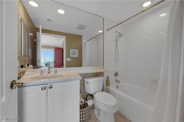 full bathroom featuring shower / tub combo with curtain, tile patterned floors, toilet, and vanity