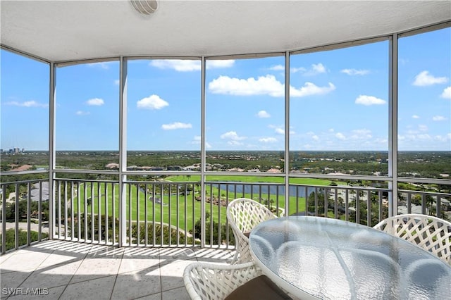 unfurnished sunroom featuring a wealth of natural light