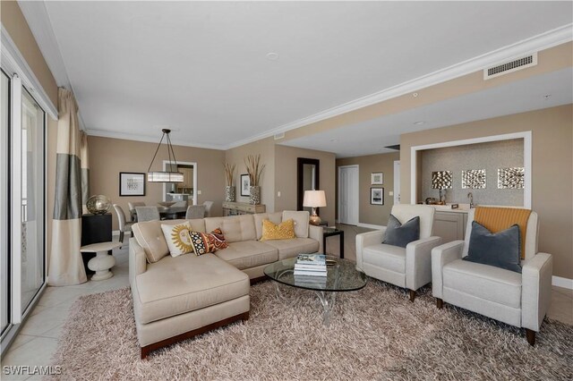 tiled living room with crown molding