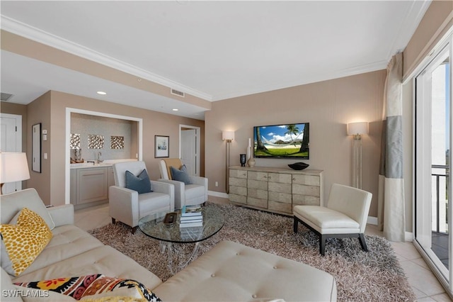 tiled living room with ornamental molding