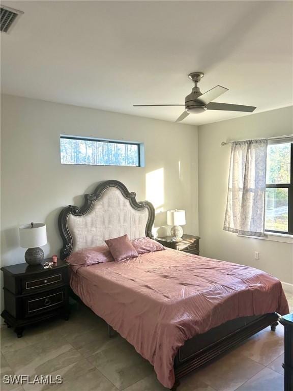 bedroom featuring ceiling fan