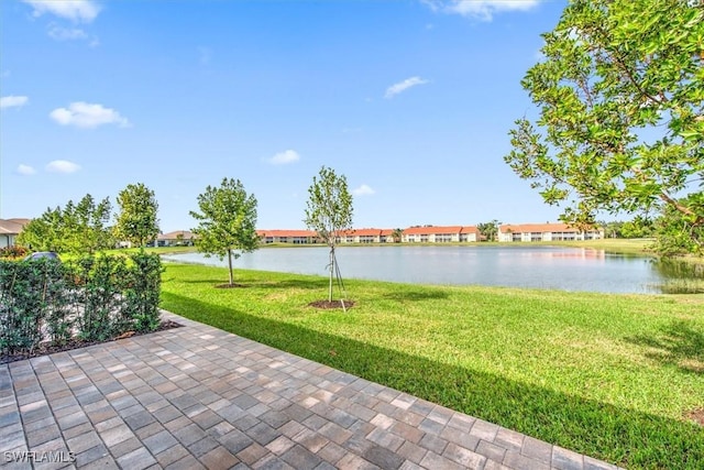 view of yard with a water view