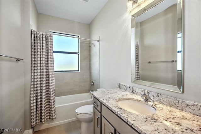 full bathroom with toilet, vanity, and shower / tub combo with curtain