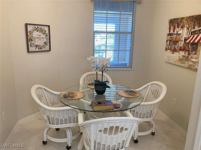 dining room featuring tile patterned flooring