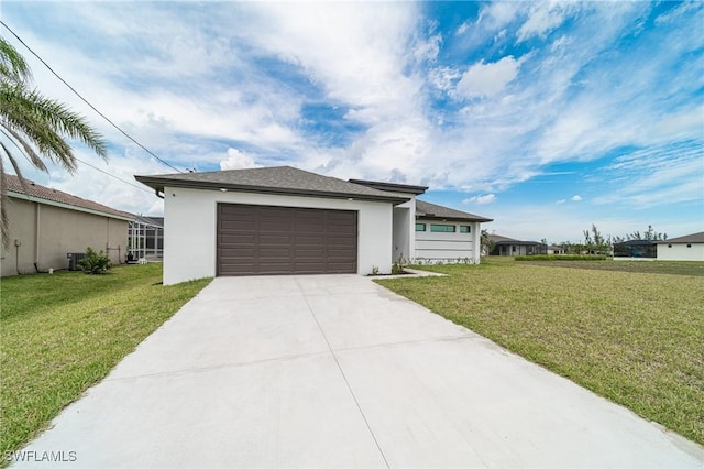 ranch-style home featuring a front yard and a garage