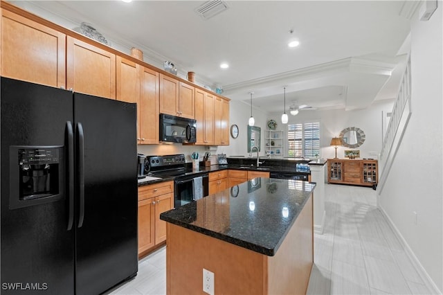 kitchen featuring pendant lighting, black appliances, sink, ceiling fan, and kitchen peninsula