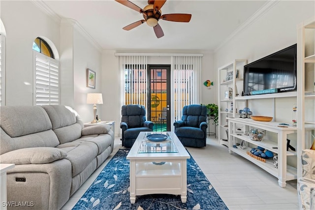 living room featuring crown molding and ceiling fan