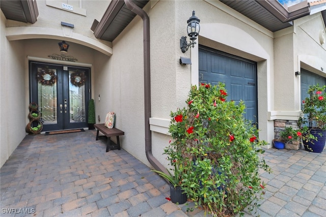 doorway to property with french doors