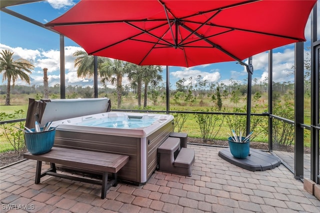 view of patio with a hot tub