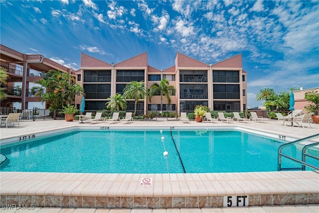 view of pool featuring a patio