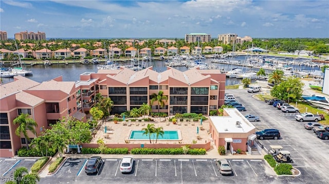 birds eye view of property featuring a water view