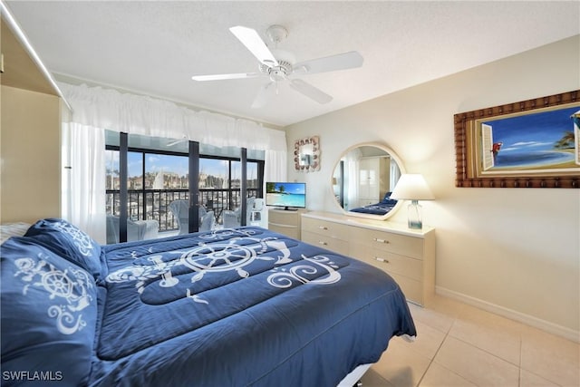 tiled bedroom with access to outside and ceiling fan