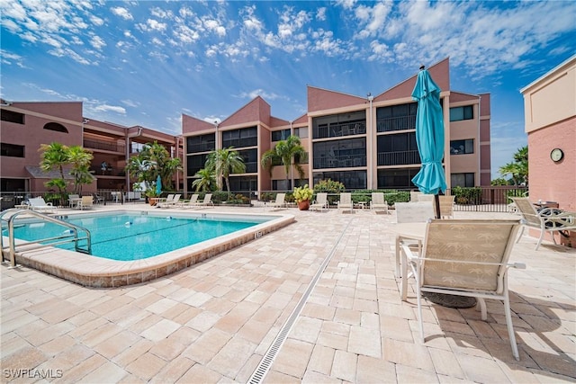 view of pool with a patio