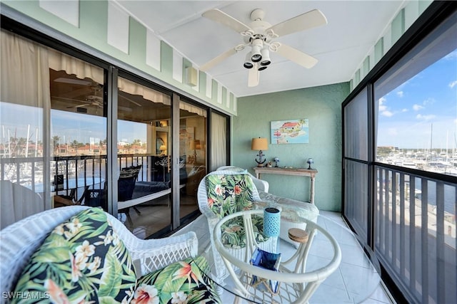 sunroom / solarium with ceiling fan