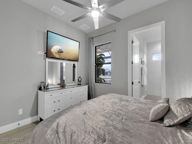 bedroom with light wood-type flooring and ceiling fan