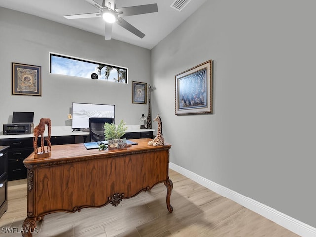 office with ceiling fan and light wood-type flooring