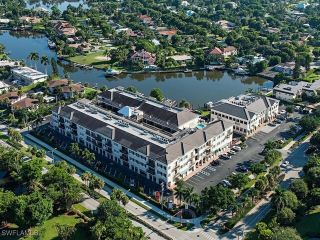 drone / aerial view with a water view