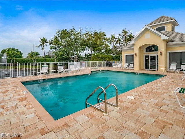 view of pool featuring a patio area