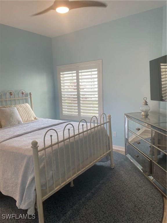 bedroom with carpet flooring and ceiling fan