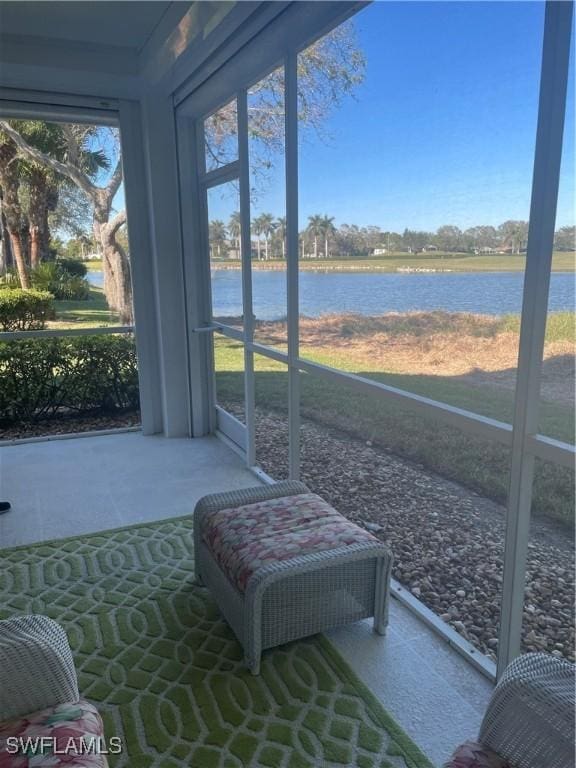 sunroom with a water view