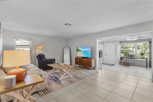 living room featuring light tile patterned floors