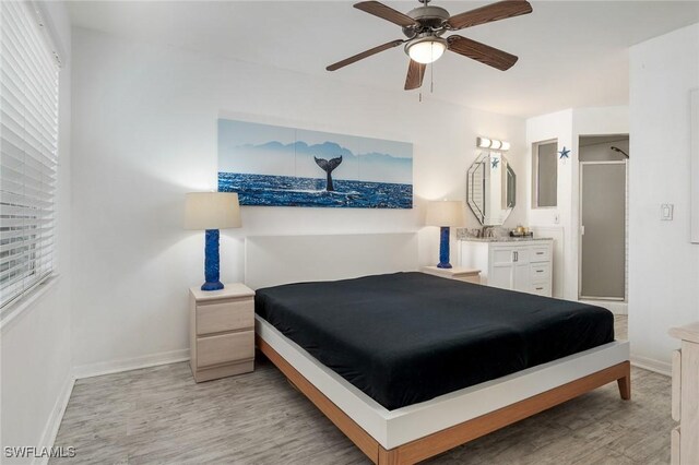 bedroom with light hardwood / wood-style flooring and ceiling fan