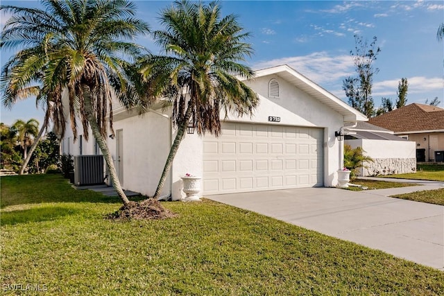 view of property exterior with a lawn, driveway, an attached garage, and stucco siding