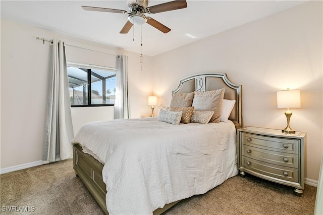 bedroom featuring ceiling fan and carpet