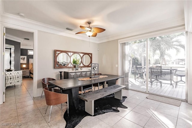 dining area with ceiling fan, light tile patterned floors, and a wealth of natural light