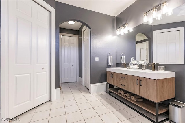 bathroom featuring tile patterned floors and vanity