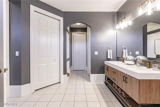 bathroom featuring tile patterned floors and vanity