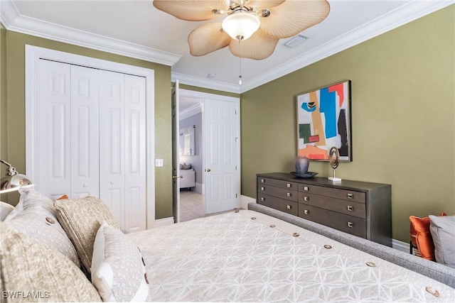 bedroom with a closet, ornamental molding, and ceiling fan