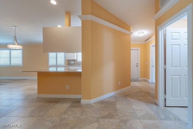 interior space with crown molding