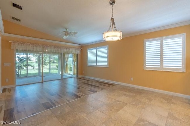 unfurnished room with a wealth of natural light, ceiling fan, and crown molding