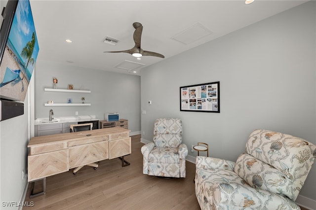 office area with recessed lighting, visible vents, attic access, wood finished floors, and baseboards