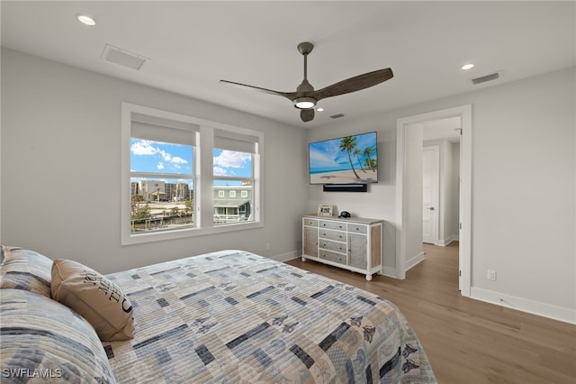 730 Matanzas Ct, Fort Myers Beach, FL 33931 - bedroom featuring wood finished floors, baseboards, visible vents, and recessed lighting