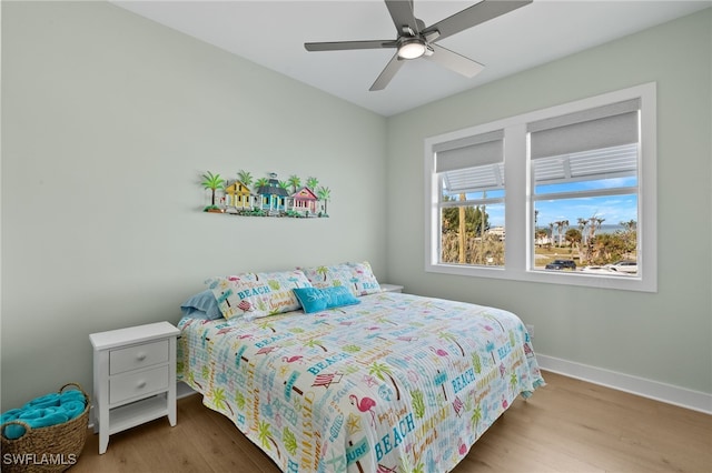 730 Matanzas Ct, Fort Myers Beach, FL 33931 - bedroom featuring wood finished floors, ceiling fan, and baseboards